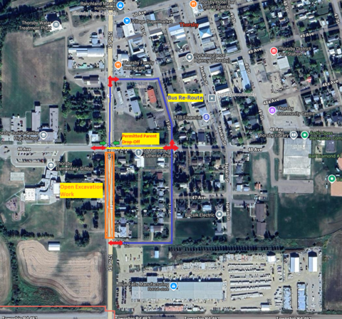 CLICK OR TAP TO ENLARGE THE IMAGE [Orange is the current affected work site. Yellow is permitted parent drop off. Blue is the bus reroute past the work zone. Green arrows are the crosswalks, red arrows are directional indicators.]